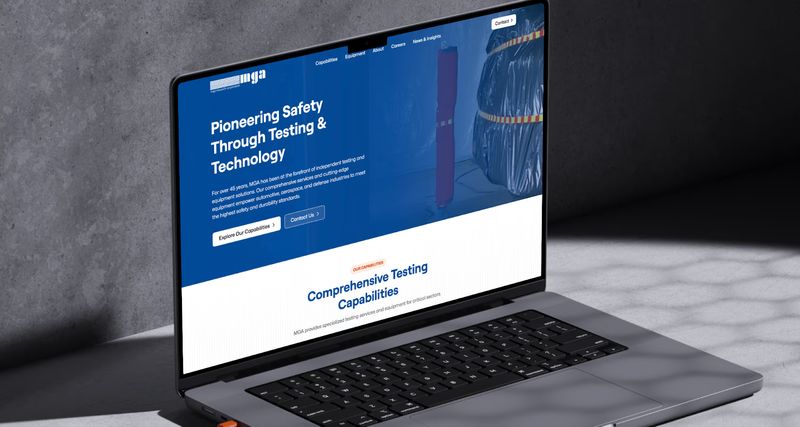 B2B company MGA Research Corporation's redesigned home page shown on a laptop computer