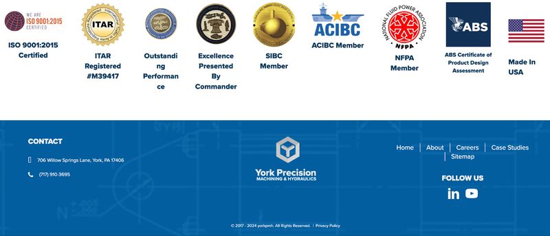 York Precision Machining & Hydraulics' website footer featuring trust badges and certifications