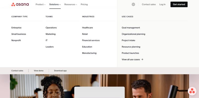 Asana’s mega menu under the 'Solutions' tab, displaying a well-organized layout of categories and links
